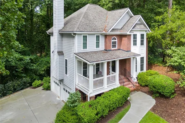a house view with a garden space