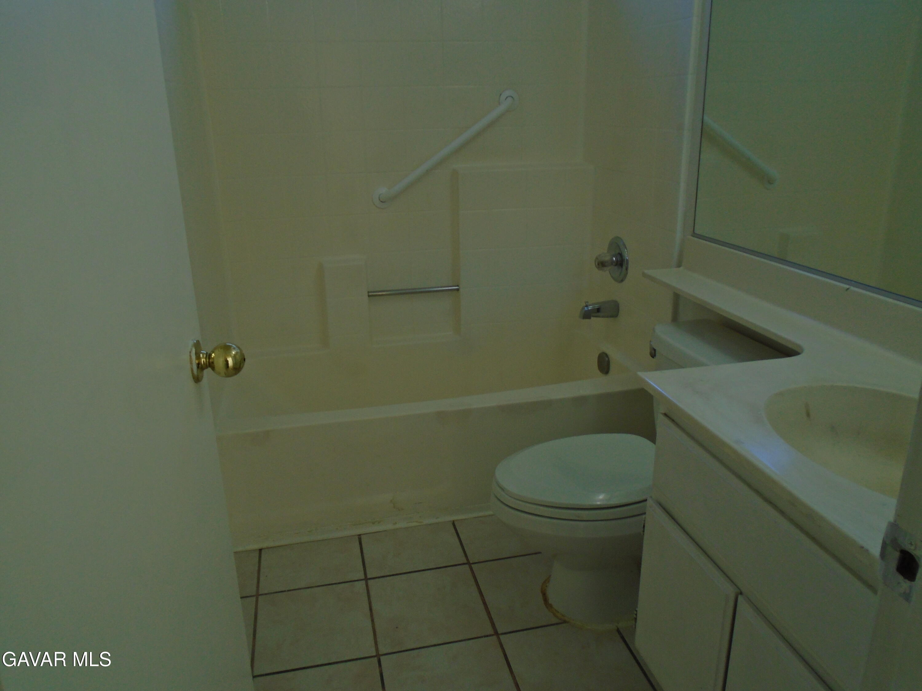 37739 Cardiff Street Palmdale, CA 93550 - Photo 13 of 32 a bathroom with a sink a toilet and shower
