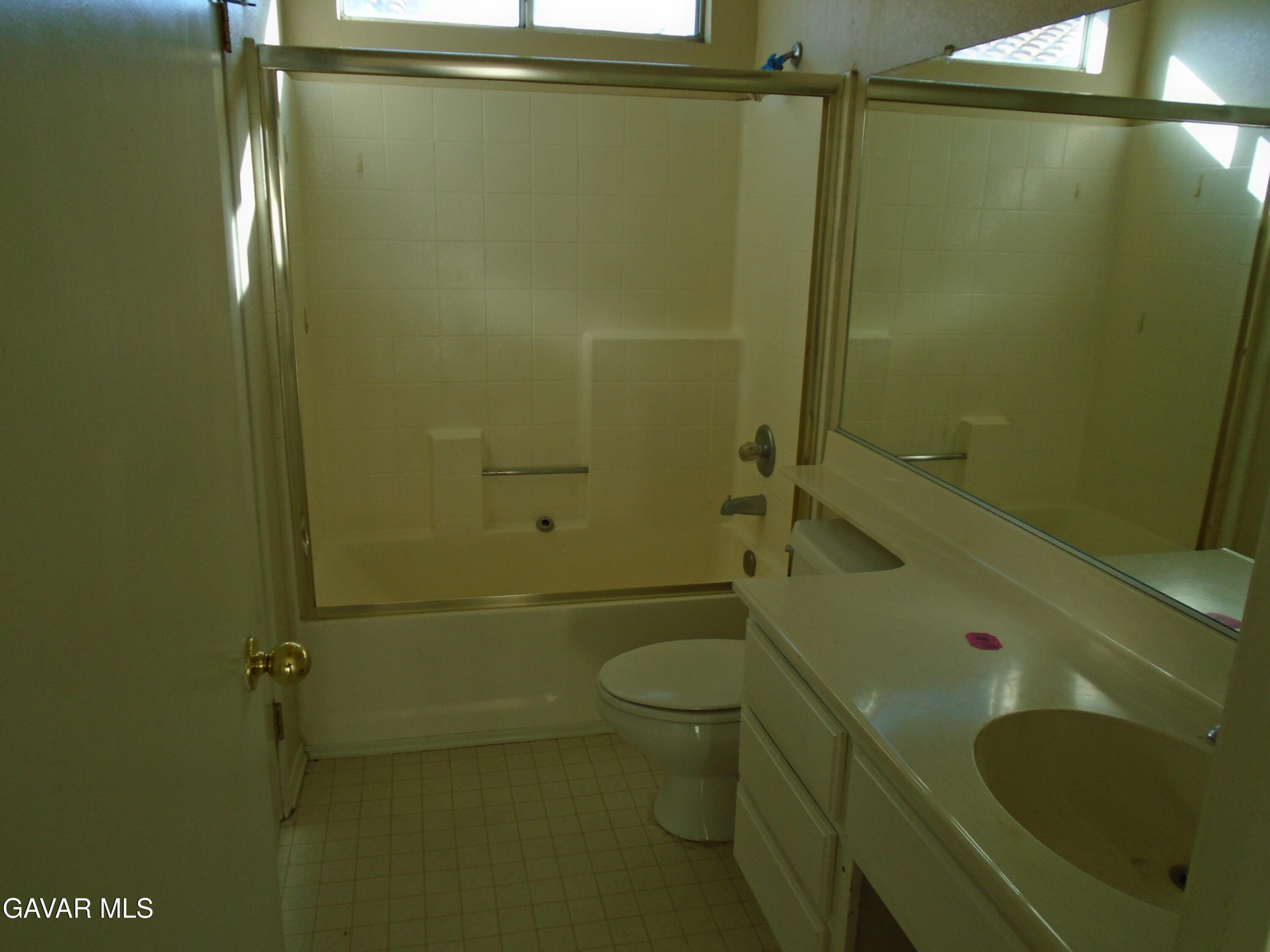 37739 Cardiff Street Palmdale, CA 93550 - Photo 18 of 32 a bathroom with a sink a toilet and shower
