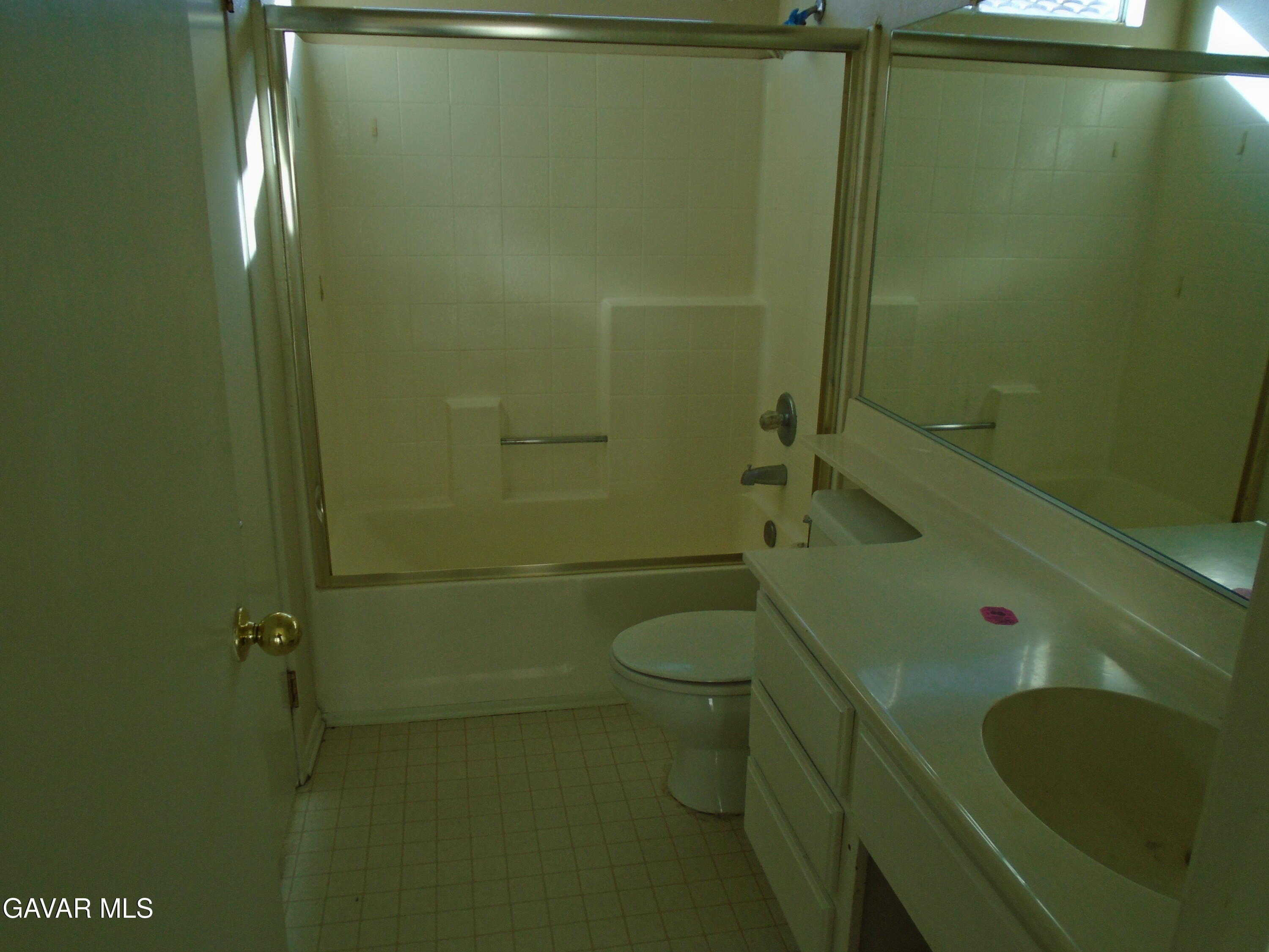 37739 Cardiff Street Palmdale, CA 93550 - Photo 19 of 32 a bathroom with a sink a toilet and shower
