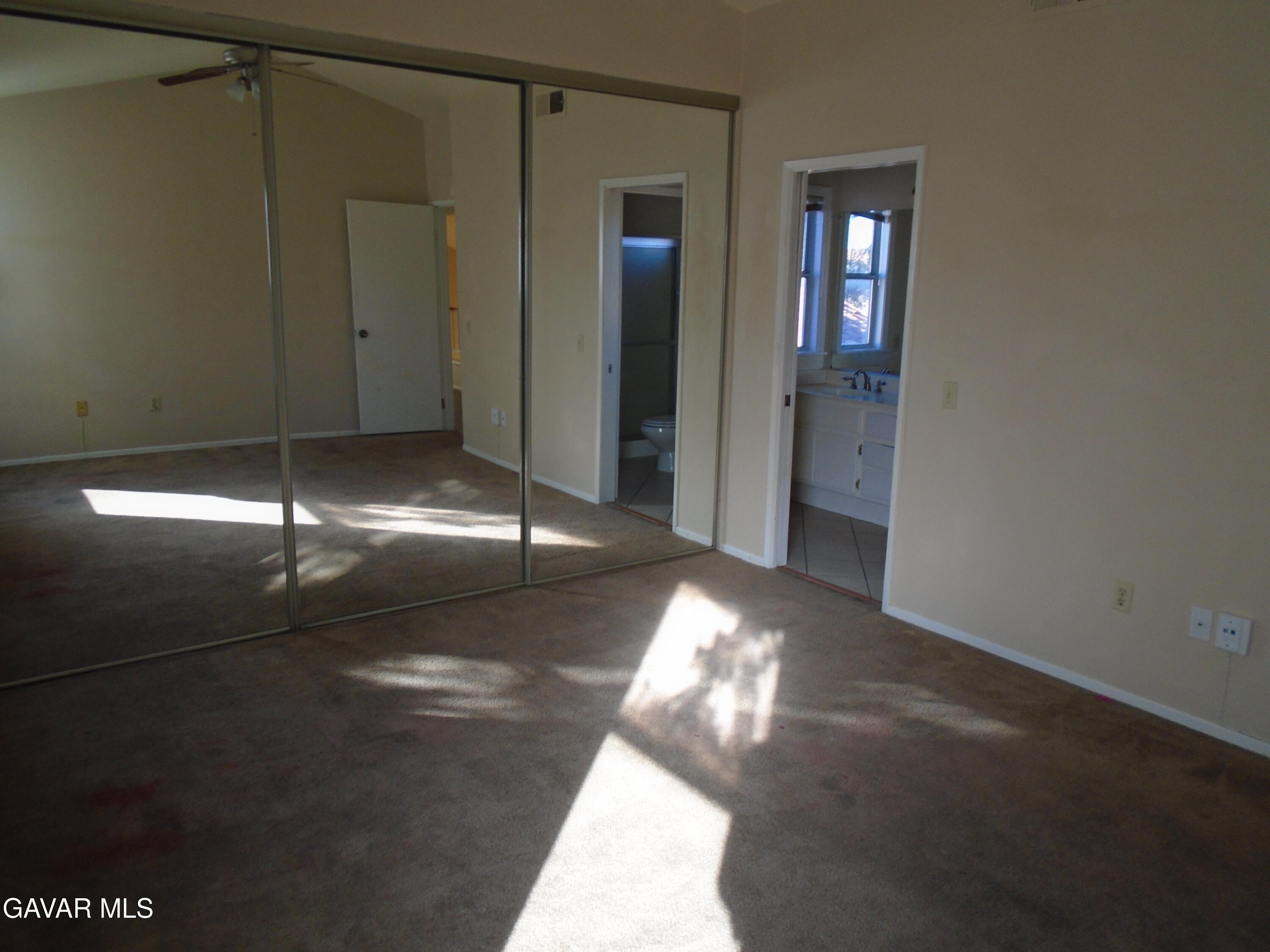 37739 Cardiff Street Palmdale, CA 93550 - Photo 24 of 32 a view of a hallway with an empty room