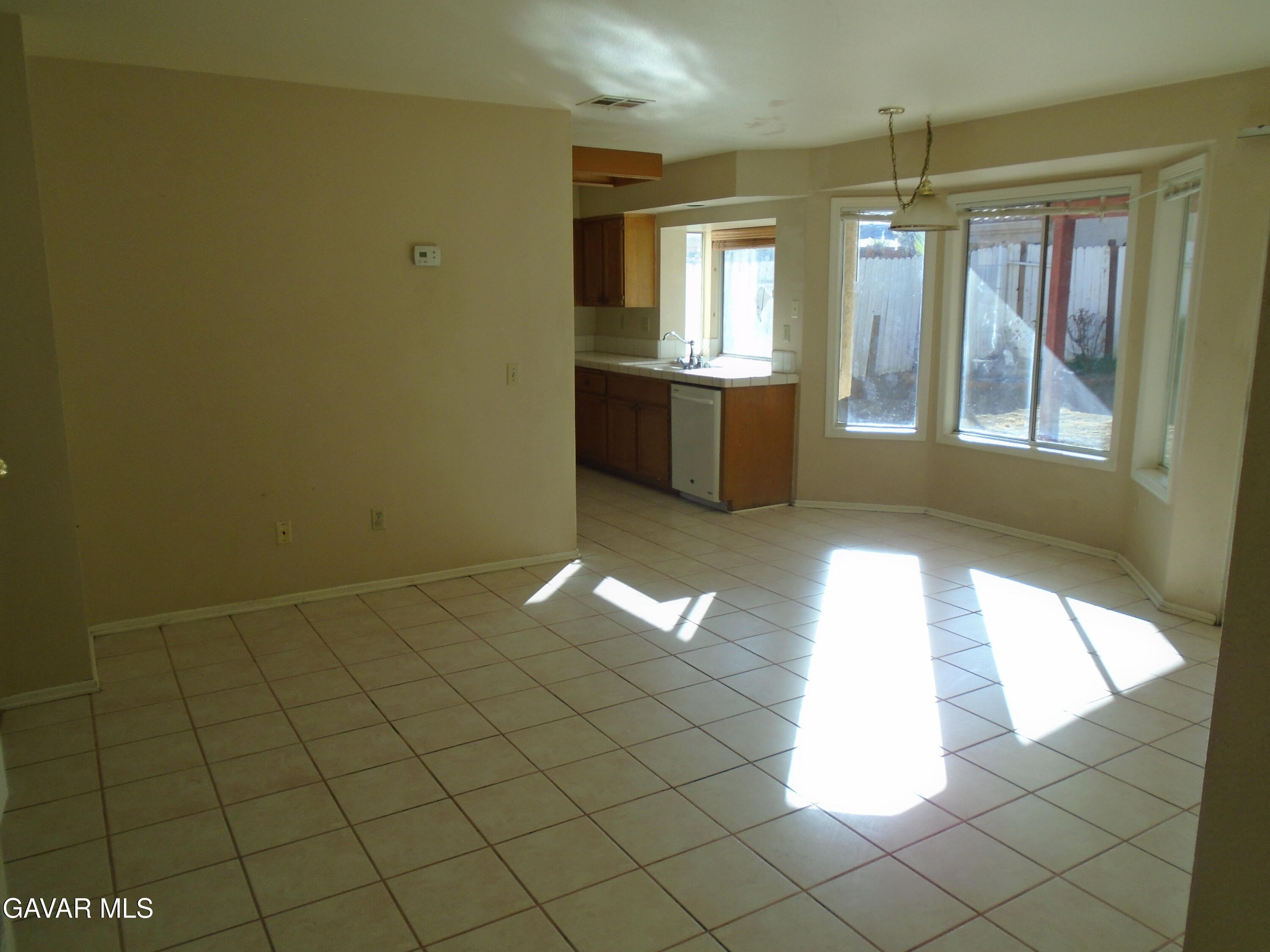 37739 Cardiff Street Palmdale, CA 93550 - Photo 3 of 32 a view of an empty room and window