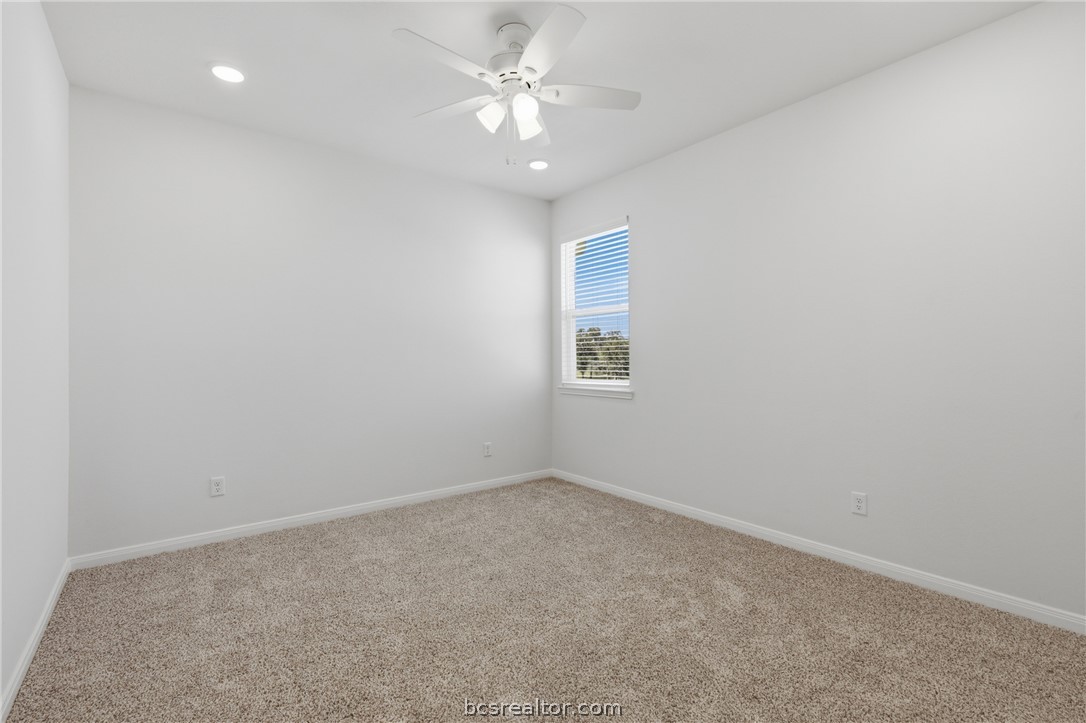 1922 Viva Road Bryan, TX 77807 - Photo 28 of 45 Spacious upstairs bedroom with comfortable layout and abundant natural light.