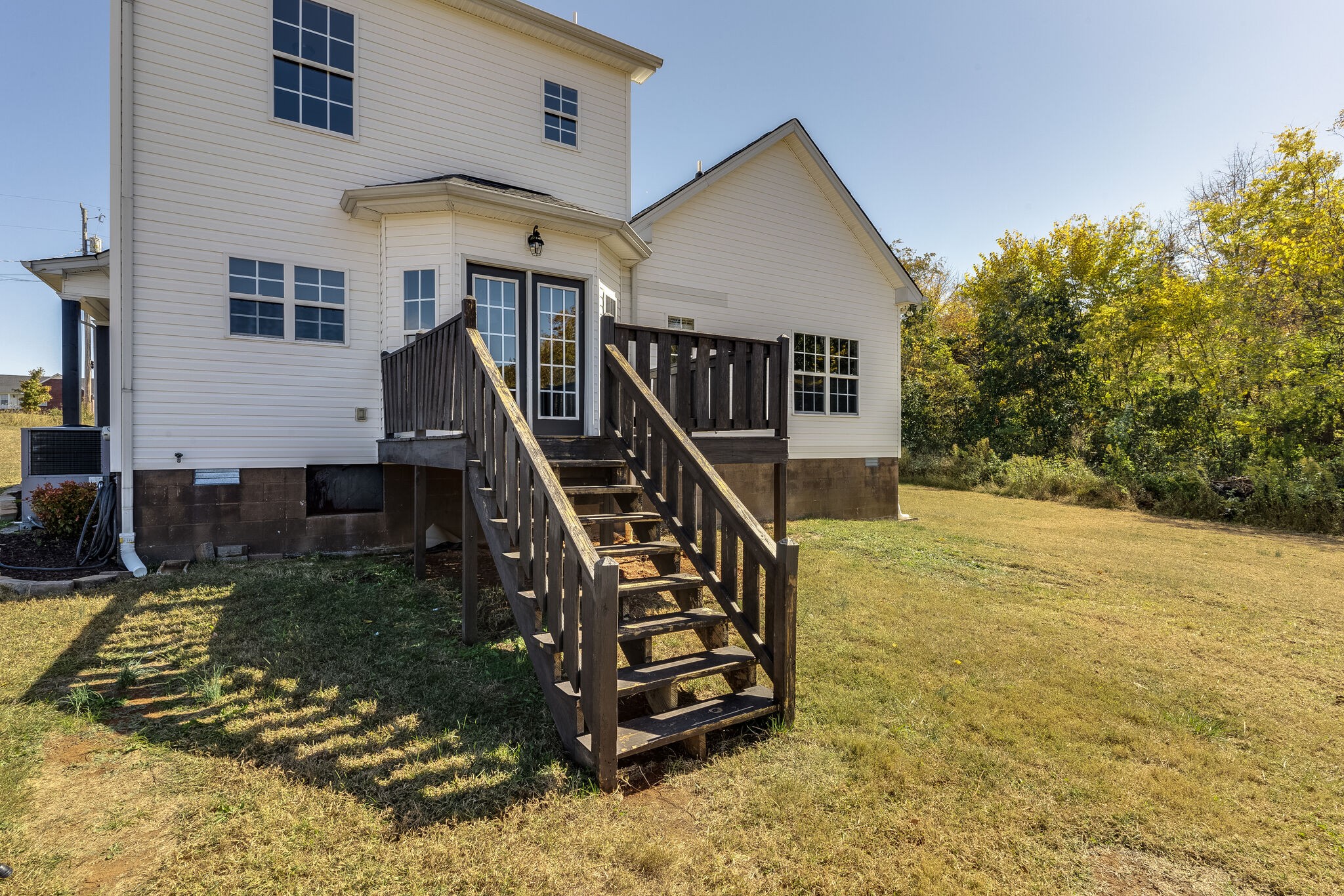 389 Coker Ford Road Portland, TN 37148 - Photo 13 of 15 a view of a house with wooden stairs