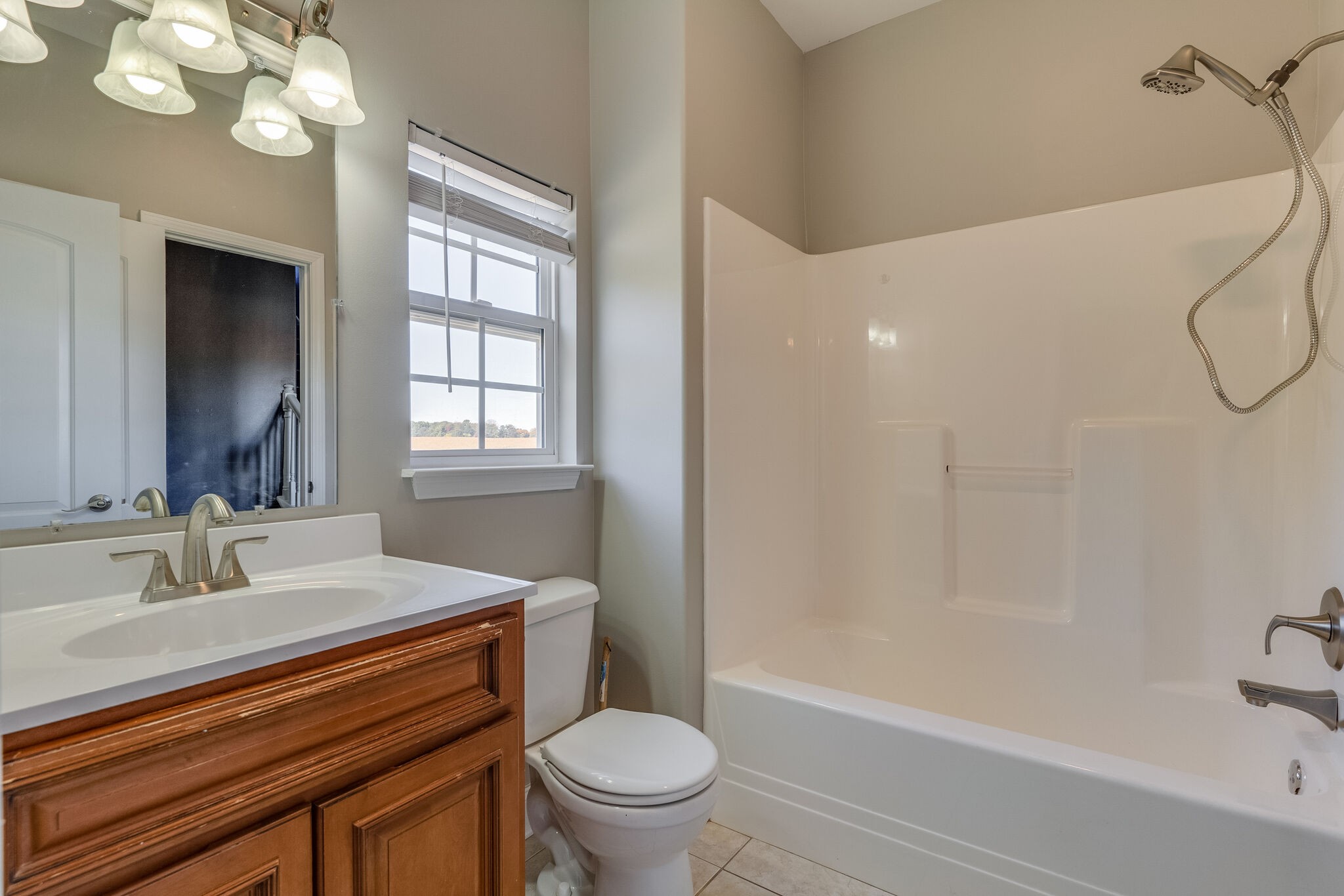 389 Coker Ford Road Portland, TN 37148 - Photo 9 of 15 a bathroom with a sink a toilet and a bathtub