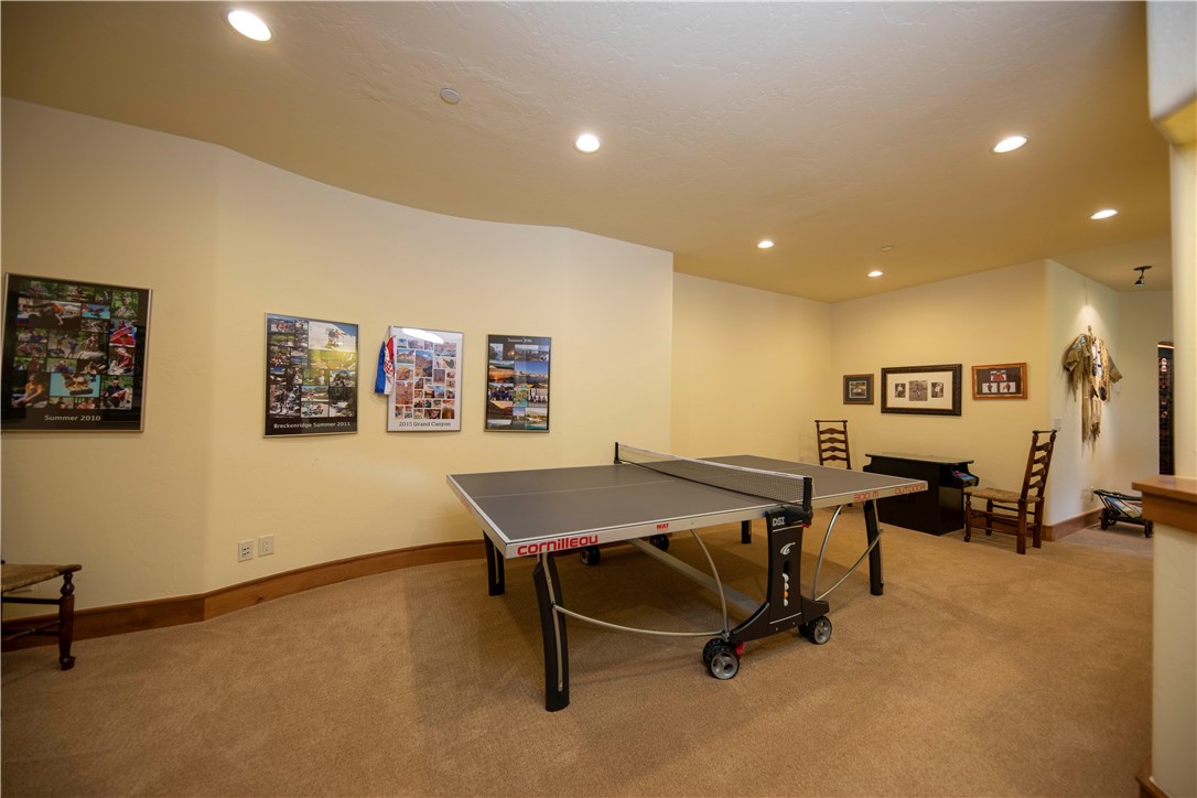211 Highlands Drive Breckenridge, CO 80424 - Photo 21 of 35 This game area in the lower level is perfect for ping pong, pool table or darts, the possibilities are endless!