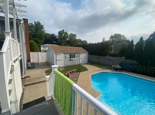a view of a balcony with an outdoor space