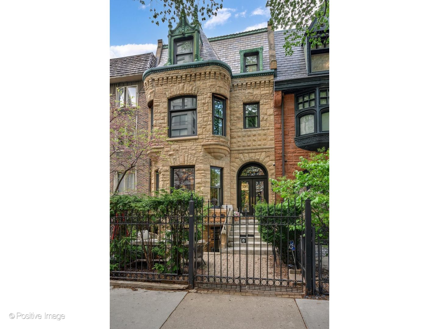 32 East Bellevue Place Chicago, IL 60611 - Photo 1 of 52 a front view of a house with plants