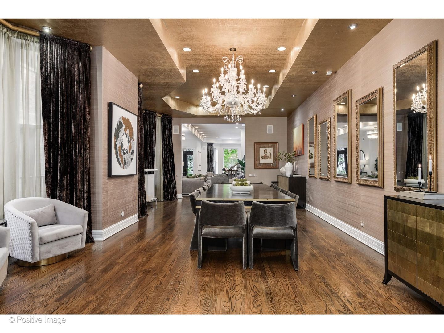 32 East Bellevue Place Chicago, IL 60611 - Photo 13 of 52 a view of a dining room with furniture a chandelier and wooden floor