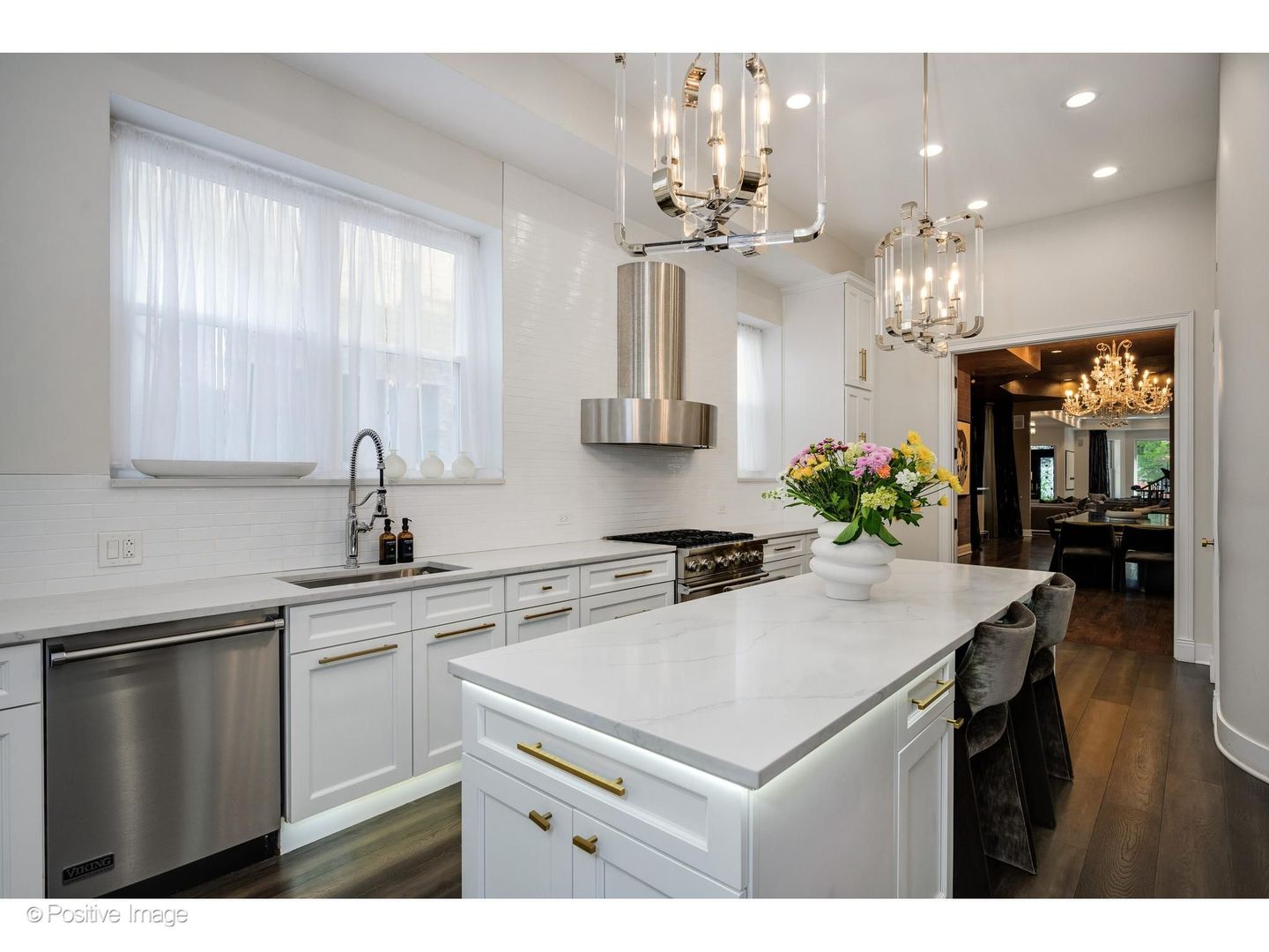 32 East Bellevue Place Chicago, IL 60611 - Photo 18 of 52 a kitchen with a sink a counter top space and appliances