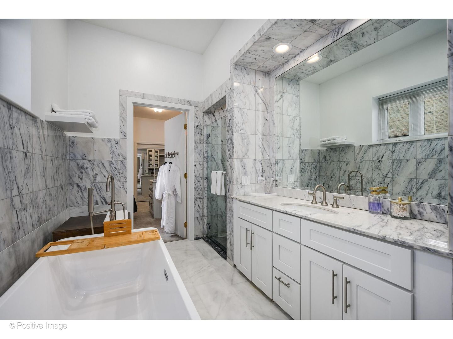 32 East Bellevue Place Chicago, IL 60611 - Photo 31 of 52 a bathroom with a double vanity sink mirror and shower