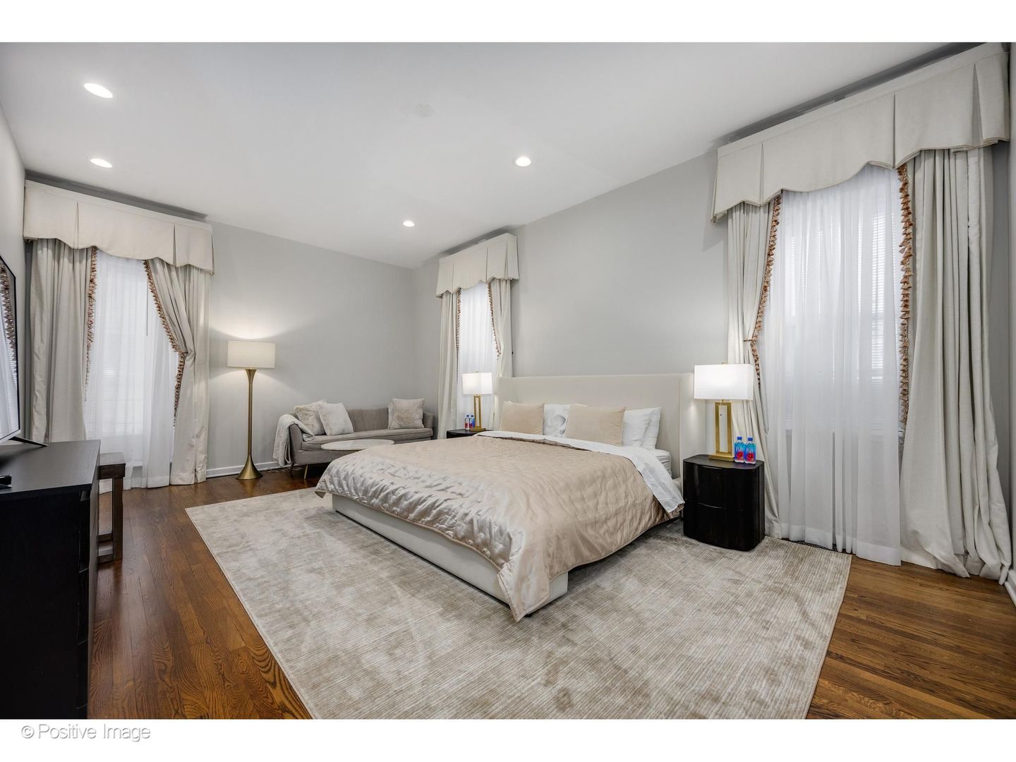 32 East Bellevue Place Chicago, IL 60611 - Photo 33 of 52 a spacious bedroom with a bed and a walk in closet