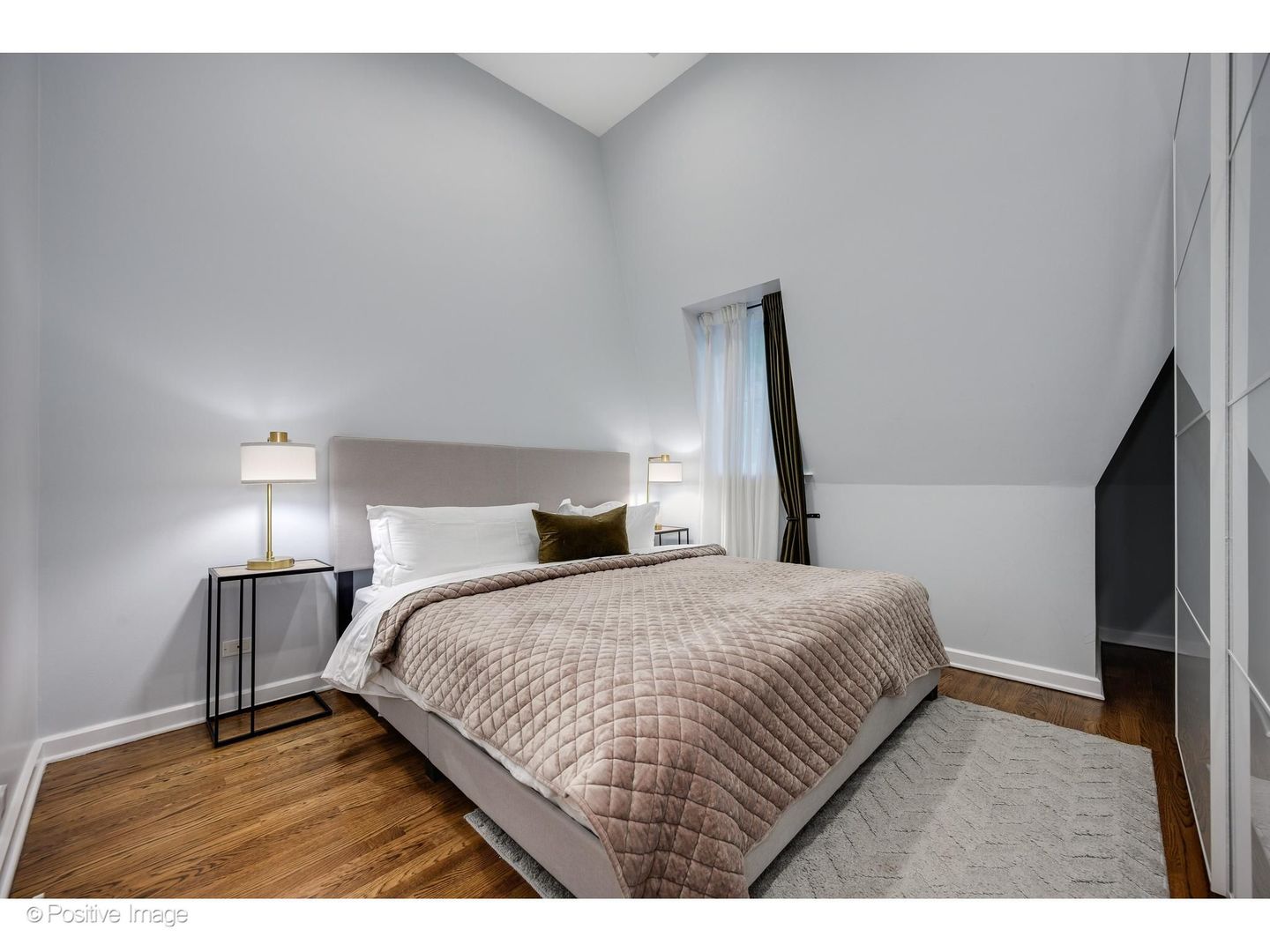 32 East Bellevue Place Chicago, IL 60611 - Photo 39 of 52 a bedroom with a bed and a night stand