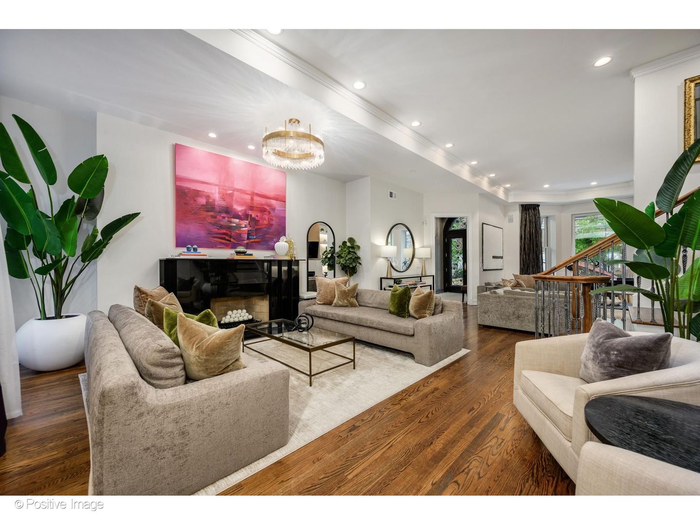 32 East Bellevue Place Chicago, IL 60611 - Photo 10 of 52 a living room with furniture a fireplace and a potted plant