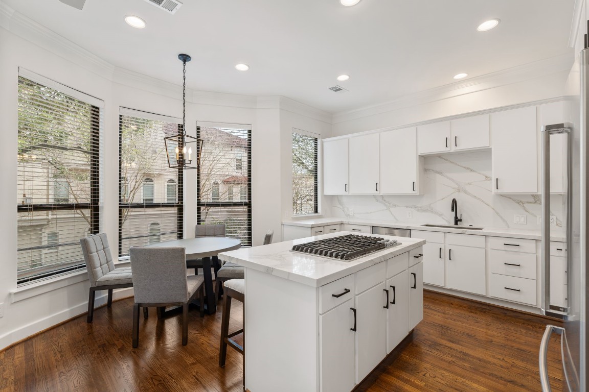 6501 Rodrigo Street Houston, TX 77007 - Photo 8 of 38 The second floor features a remodeled kitchen with updated tile and countertops, new appliances, fresh paint, and updated hardware.