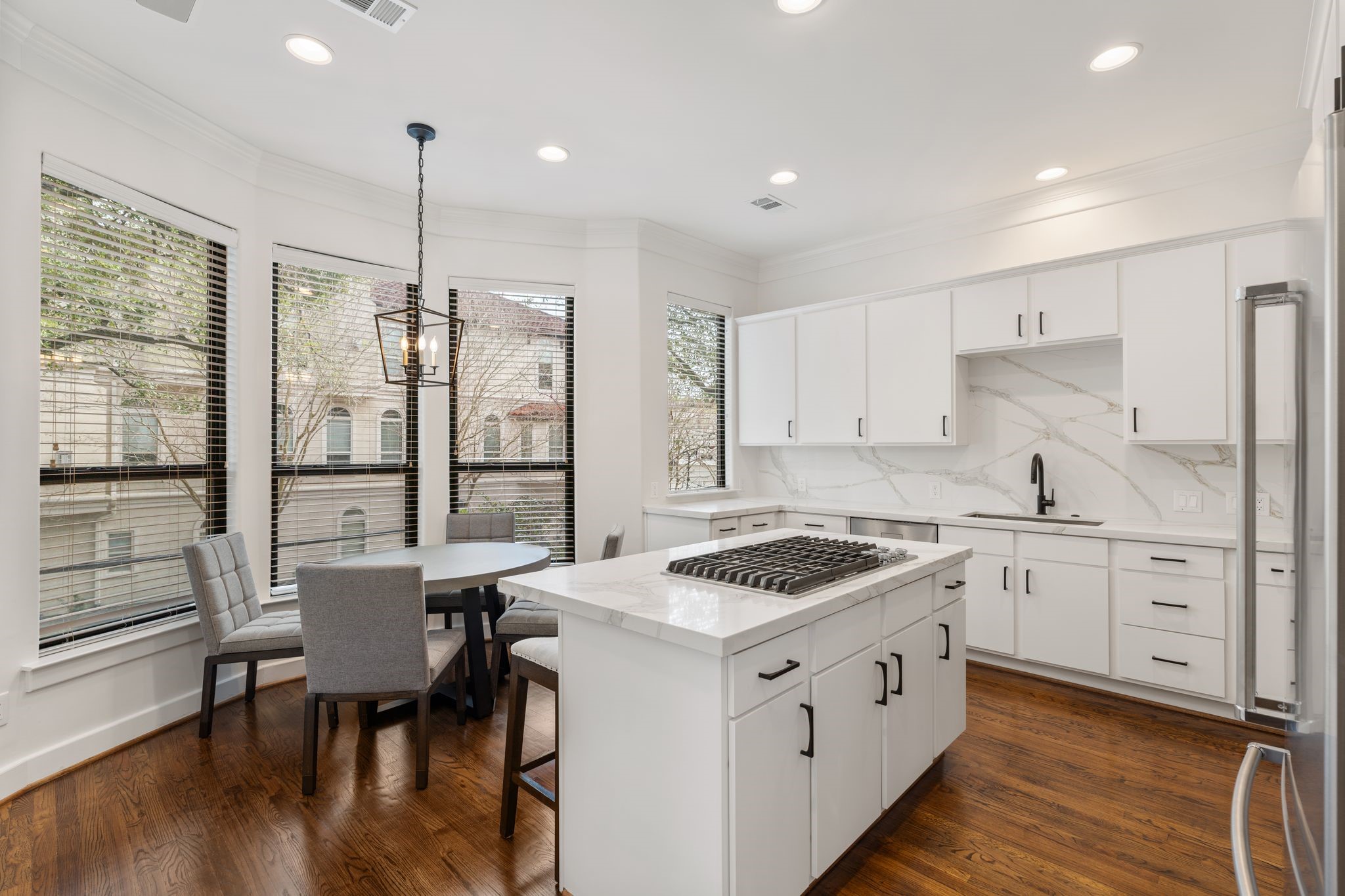 6501 Rodrigo Street Houston, TX 77007 - Photo 8 of 38 The second floor features a remodeled kitchen with updated tile and countertops, new appliances, fresh paint, and updated hardware.