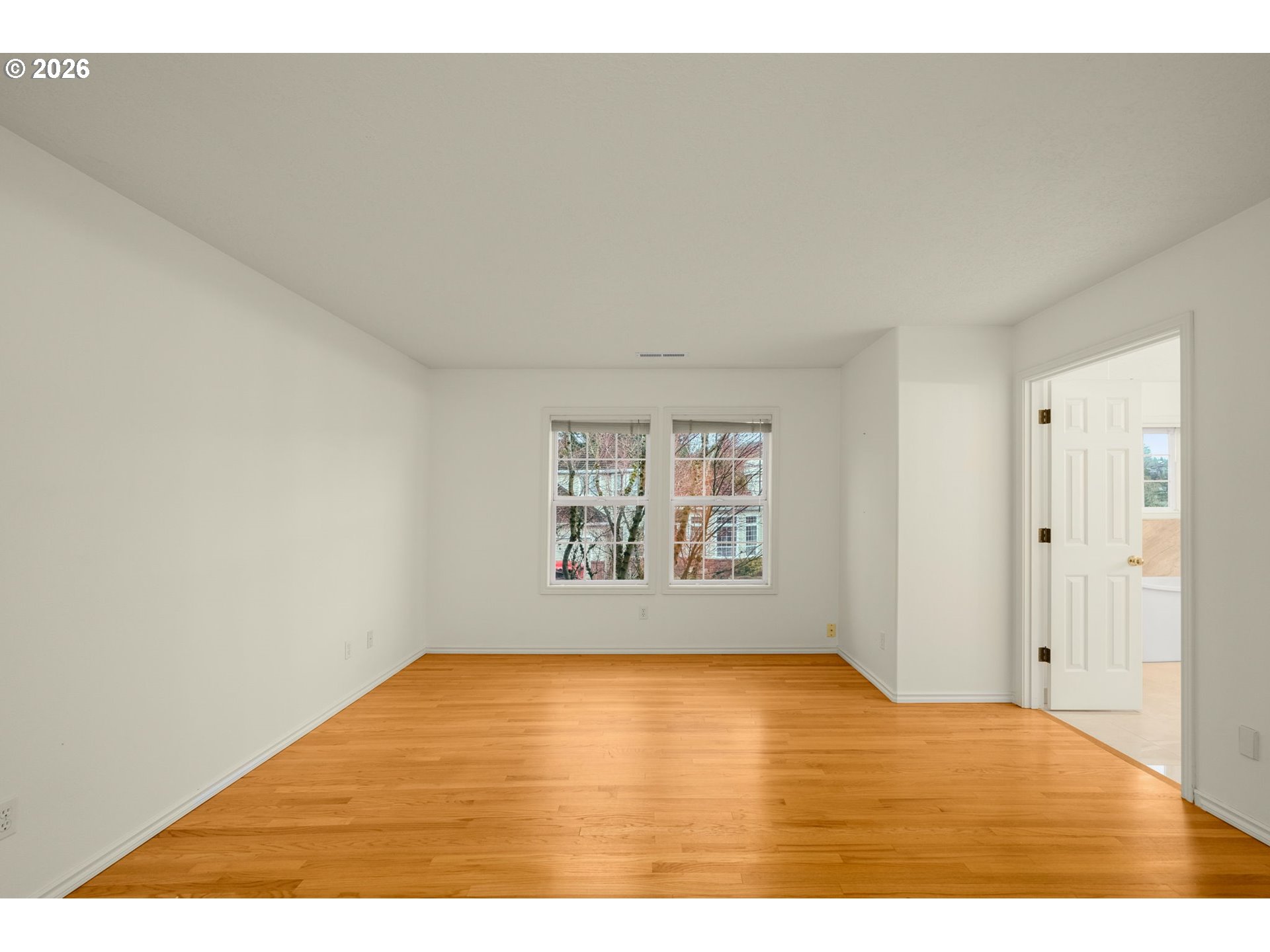 1323 Northwest Mayfield Road Portland, OR 97229 - Photo 16 of 32 a view of an empty room and window