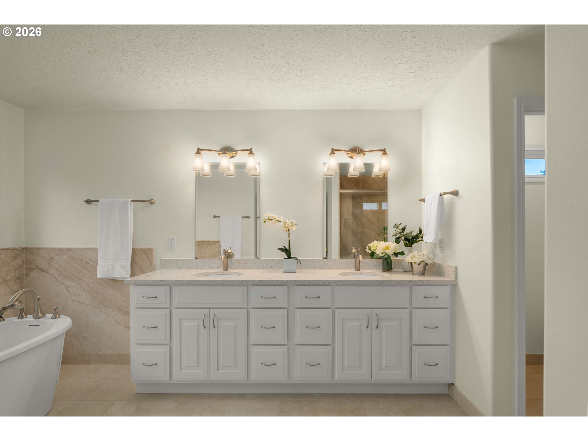 1323 Northwest Mayfield Road Portland, OR 97229 - Photo 20 of 32 a bathroom with a double vanity sink and mirror