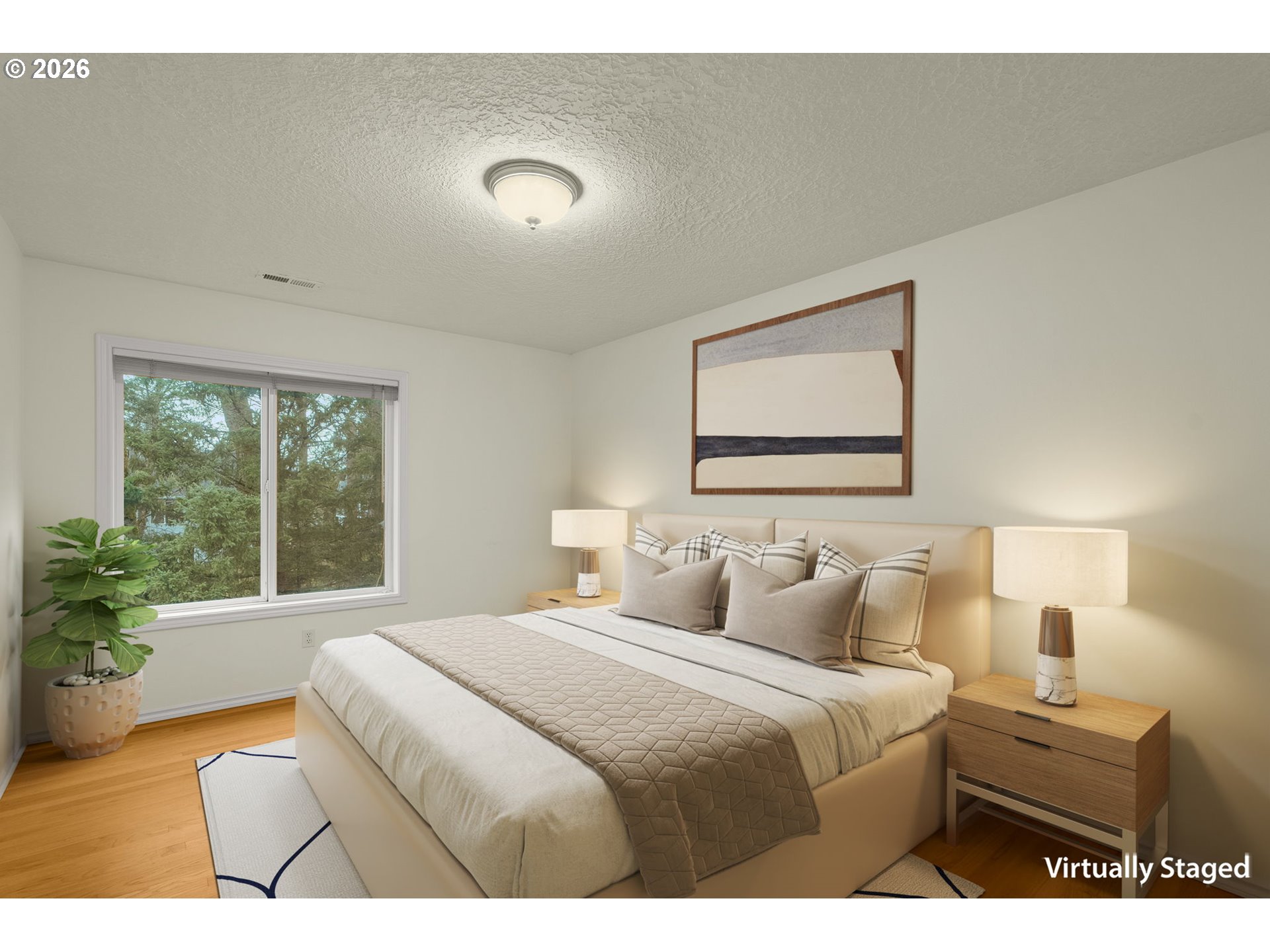 1323 Northwest Mayfield Road Portland, OR 97229 - Photo 26 of 32 a bedroom with a large bed and a large window