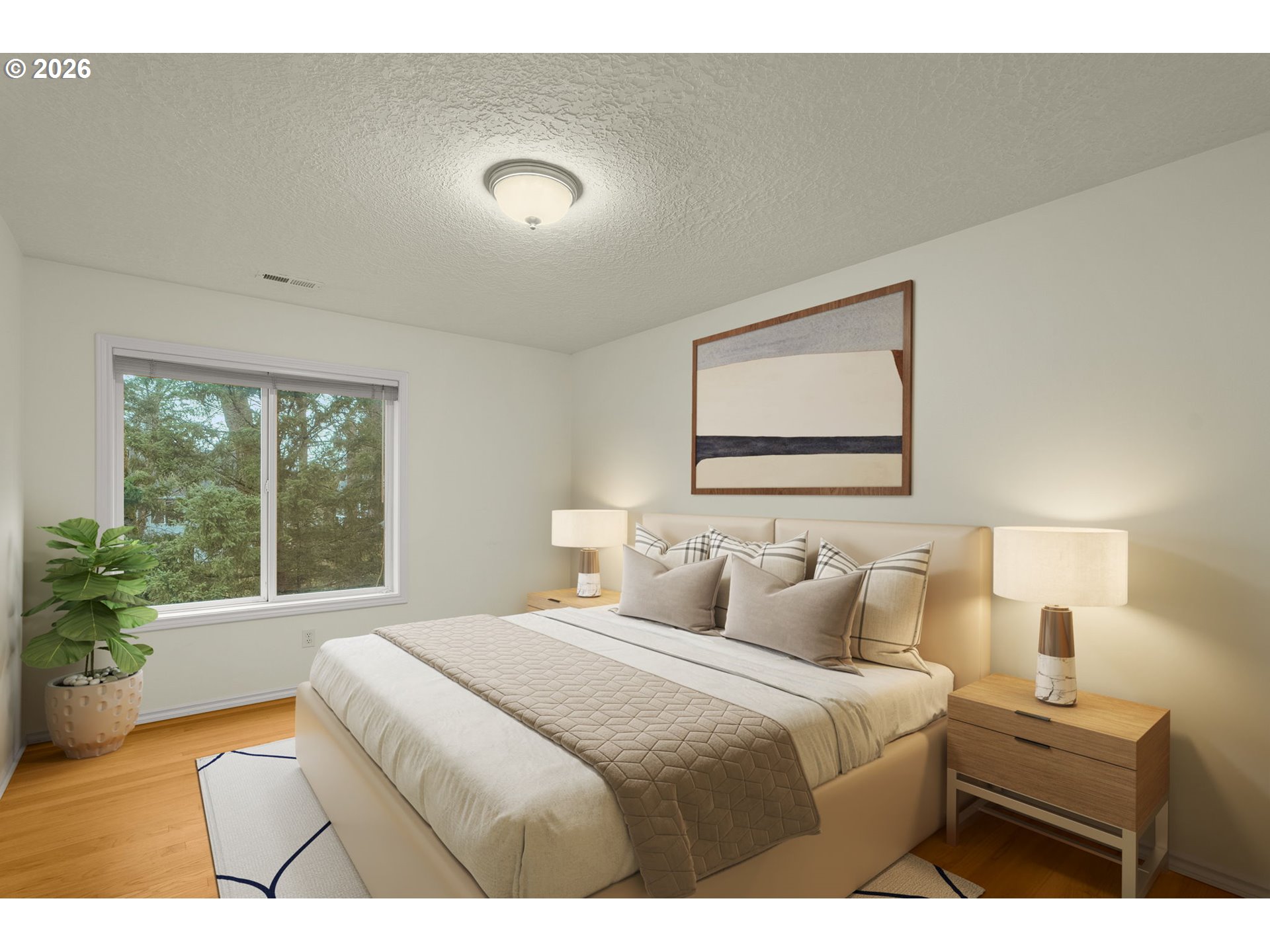 1323 Northwest Mayfield Road Portland, OR 97229 - Photo 32 of 32 a bedroom with a large bed and a large window