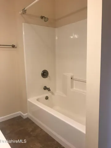 a bathroom with a bathtub