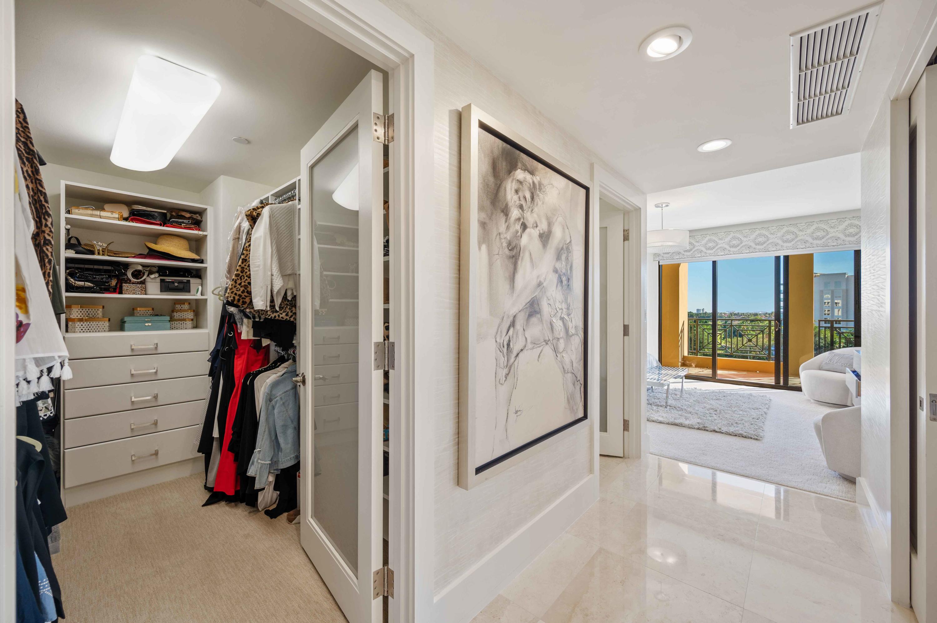 200 East Palmetto Park Road, Unit 614 Boca Raton, FL 33432 - Photo 28 of 54 His and Hers Custom Closets