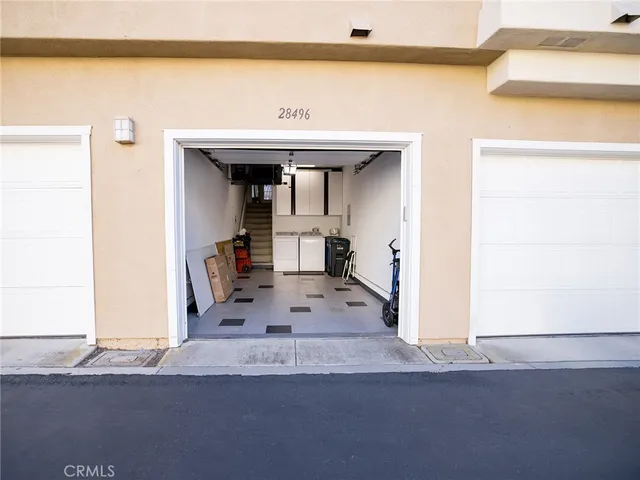 a view of a living room and hallway
