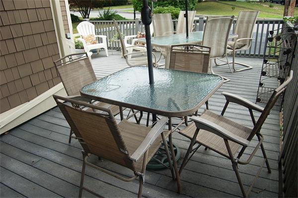 145 Star Avenue Woonsocket, RI 02895 - Photo 2 of 20 a view of a chairs and table in the patio