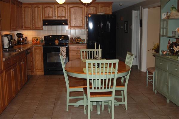 145 Star Avenue Woonsocket, RI 02895 - Photo 6 of 20 a dining room with furniture and kitchen view