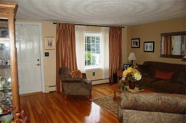 145 Star Avenue Woonsocket, RI 02895 - Photo 9 of 20 a living room with furniture and wooden floor
