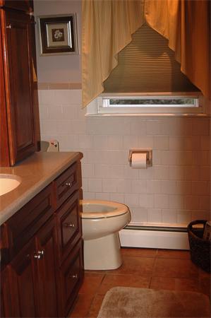 145 Star Avenue Woonsocket, RI 02895 - Photo 10 of 20 a bathroom with a toilet and a sink