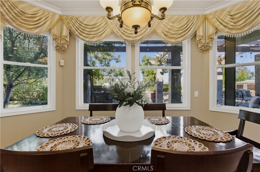 18 Asilomar Road Laguna Niguel, CA 92677 - Photo 29 of 75 a view of a dining room with furniture window and wooden floor