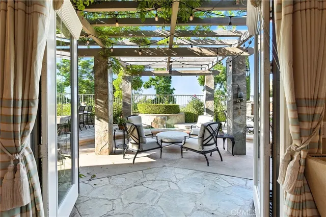 a view of a chairs and table on the deck