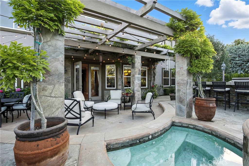 18 Asilomar Road Laguna Niguel, CA 92677 - Photo 34 of 75 Resort-style patio with heated spa and waterfall