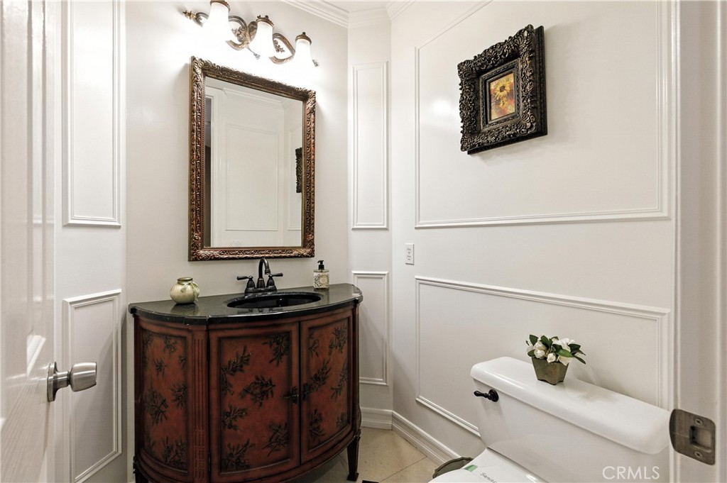 18 Asilomar Road Laguna Niguel, CA 92677 - Photo 43 of 75 a bathroom with a sink and a mirror