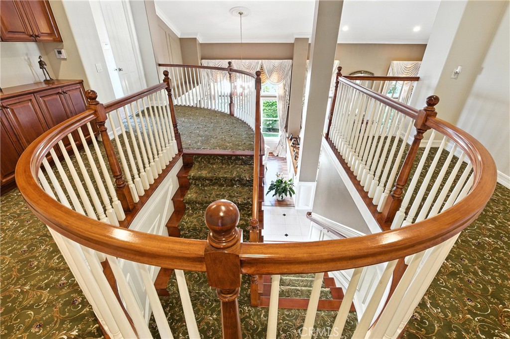 18 Asilomar Road Laguna Niguel, CA 92677 - Photo 49 of 75 a view of staircase with railing and white walls