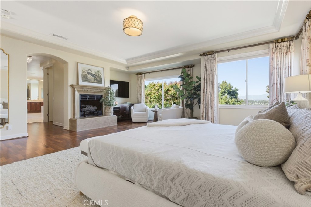 18 Asilomar Road Laguna Niguel, CA 92677 - Photo 51 of 75 a bedroom with a large bed and a large window