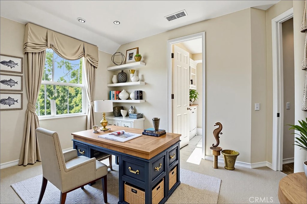 18 Asilomar Road Laguna Niguel, CA 92677 - Photo 62 of 75 a living room with stainless steel appliances furniture a rug and a window