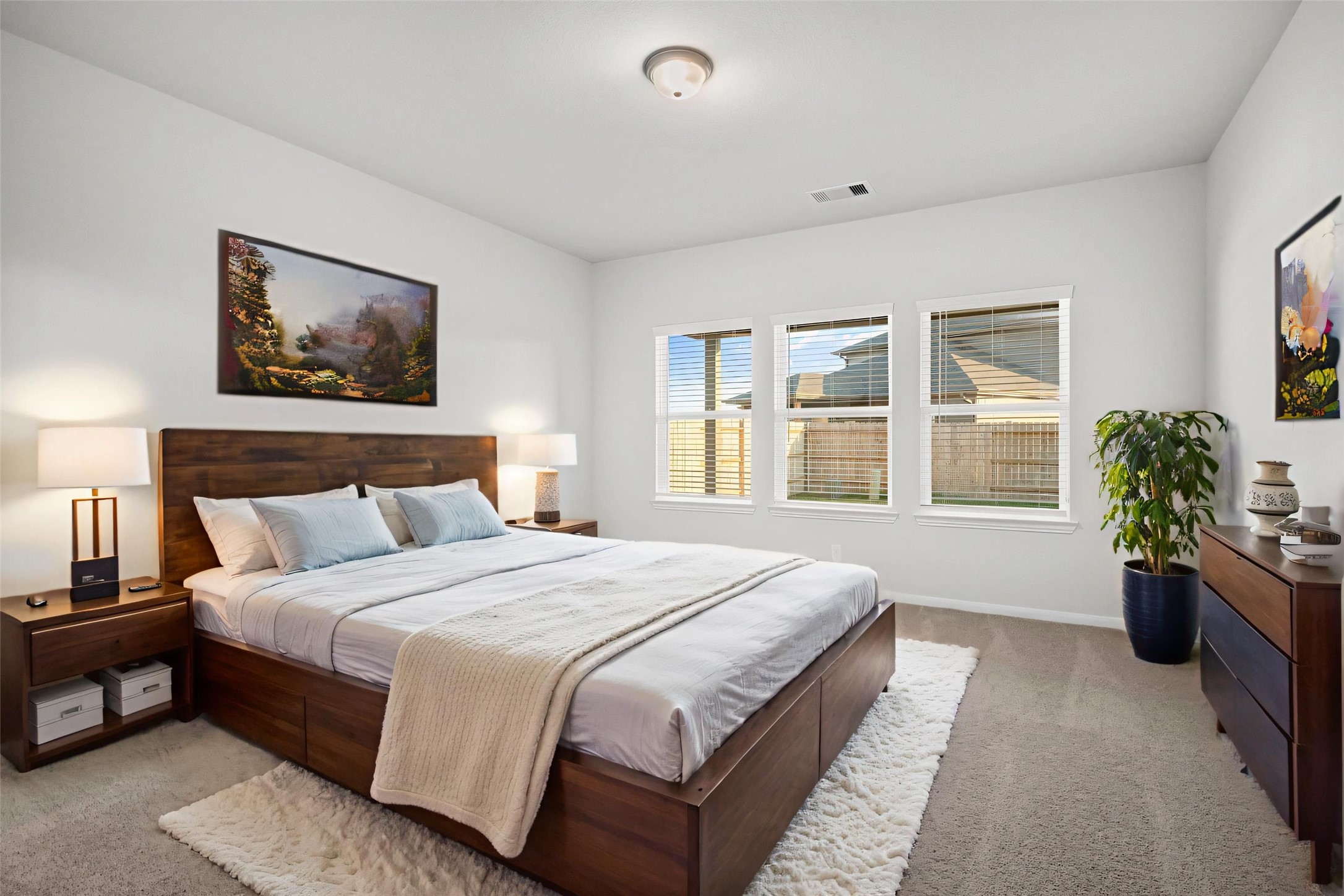 22223 Rome Breeze Drive Hockley, TX 77447 - Photo 12 of 46 This virtually staged primary bedroom radiates comfort and serenity, featuring ample natural light, plush carpet, and space for large furnishings. It’s a peaceful retreat where you can unwind and enjoy privacy after a long day. Private and tucked away for privacy!