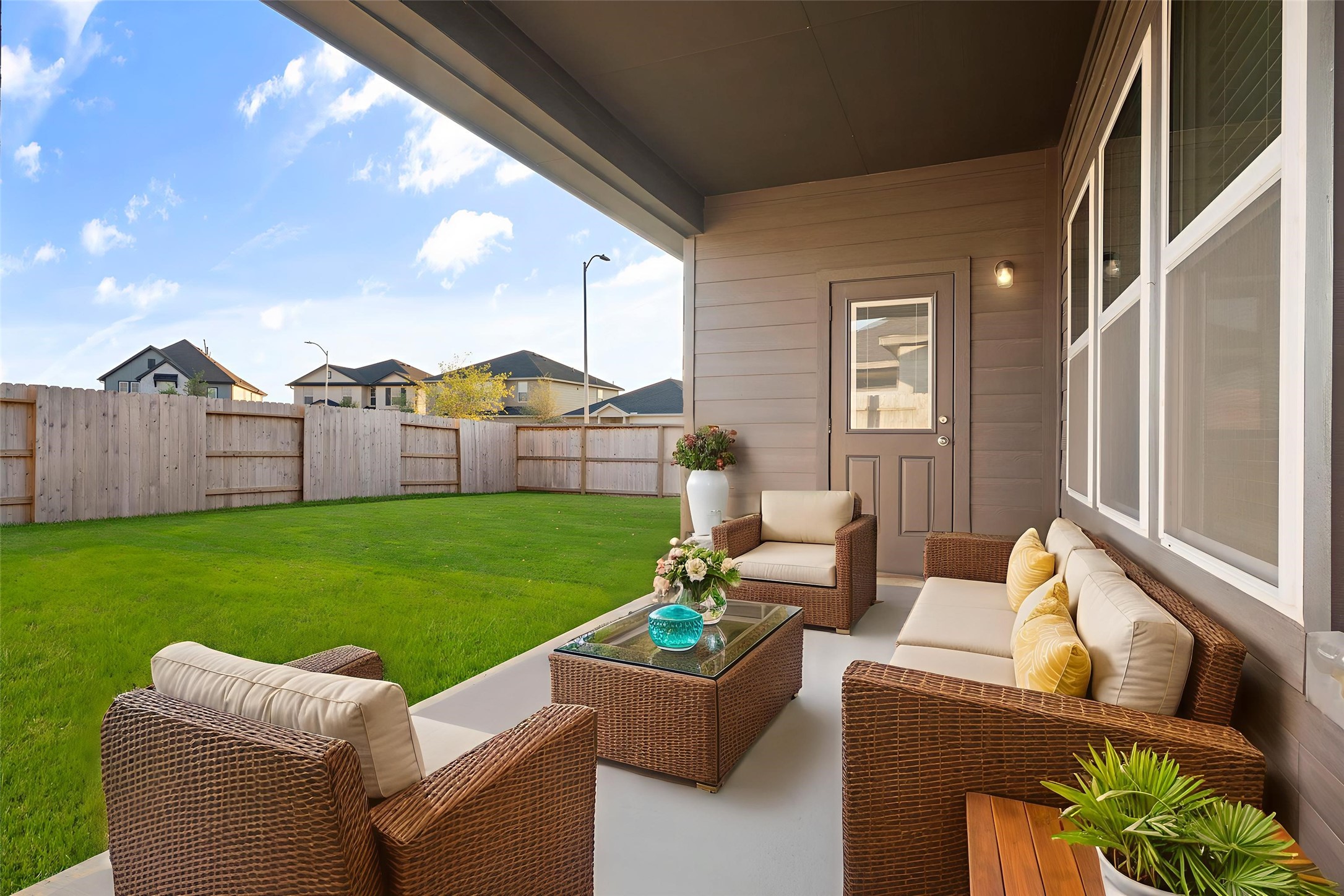 22223 Rome Breeze Drive Hockley, TX 77447 - Photo 27 of 46 Enjoy outdoor living on the covered patio that provides the perfect space for relaxing or entertaining guests. With plenty of room for seating and decor, this peaceful setting invites you to unwind and take in views of the lush backyard. Virtural staged.