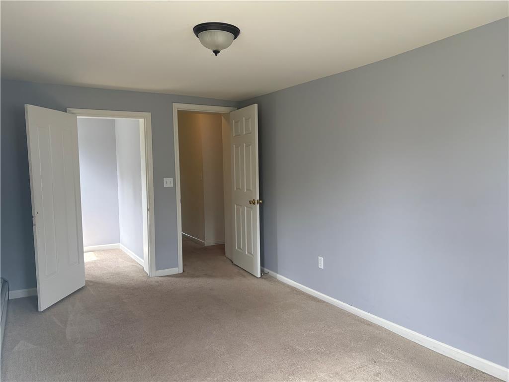 7281 Decatur Street New Tripoli, PA 18066 - Photo 14 of 27 A well-lit room offers fresh carpeting and a neutral palette, awaiting your personal touch.