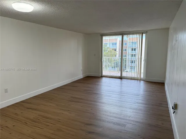 a view of a balcony and an outdoor view