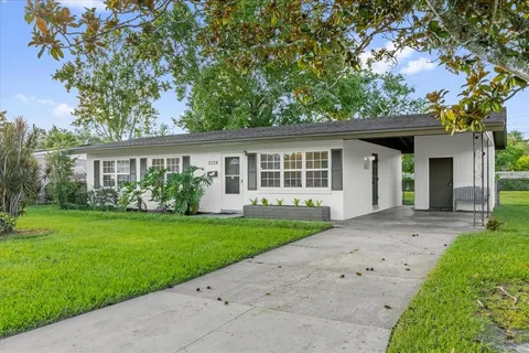 front view of a house and a yard