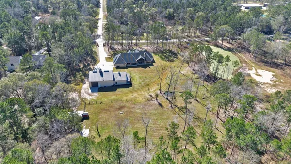 $2,470,000 | 10102 Woodlane Boulevard, Magnolia, TX 77354