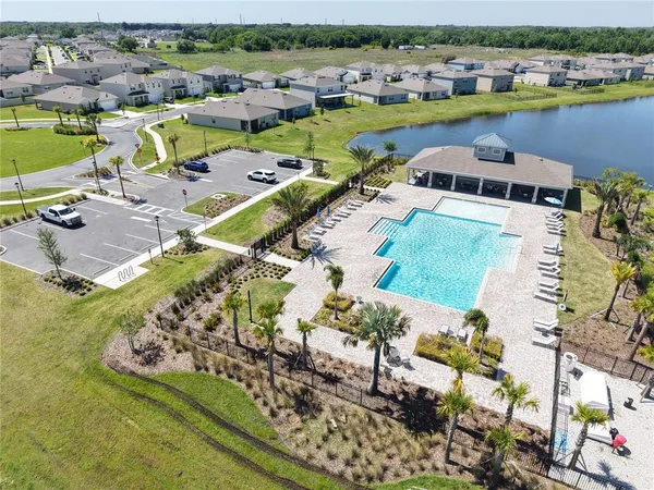 a view of a swimming pool with a lake