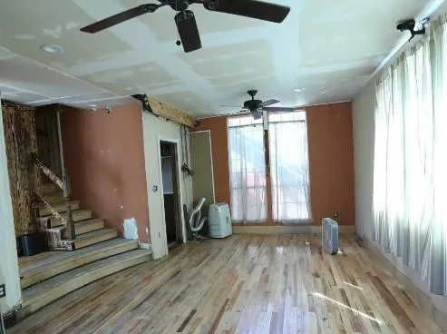a view of entryway with wooden floor