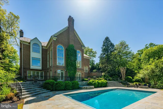 a view of a house with swimming pool