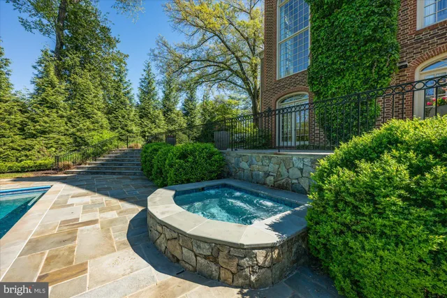 a view of swimming pool with a yard