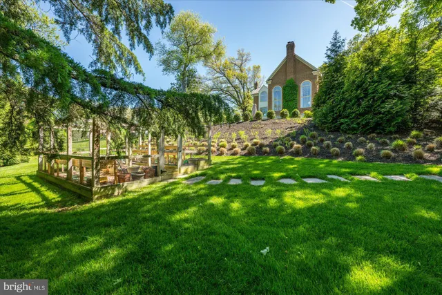 a view of front of house with a yard