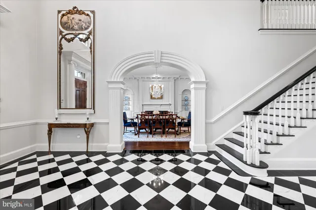 a view of a entryway door with wooden floor